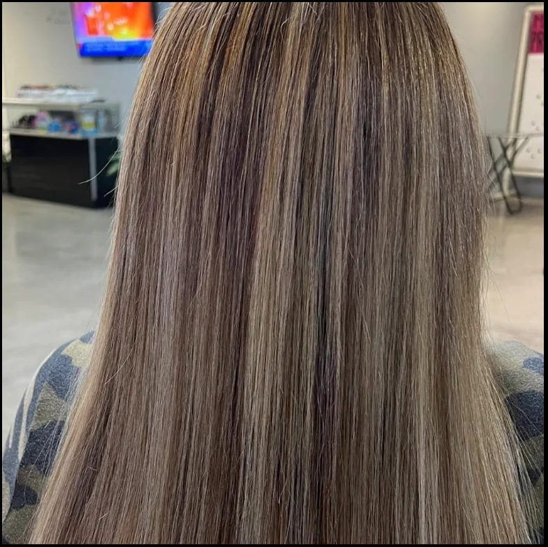 Highlighted straight hair result at Yaozmara's Beauty Salon